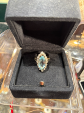 Load image into Gallery viewer, Bague navette en or gris sertie d'un aigue marine TDD. 53